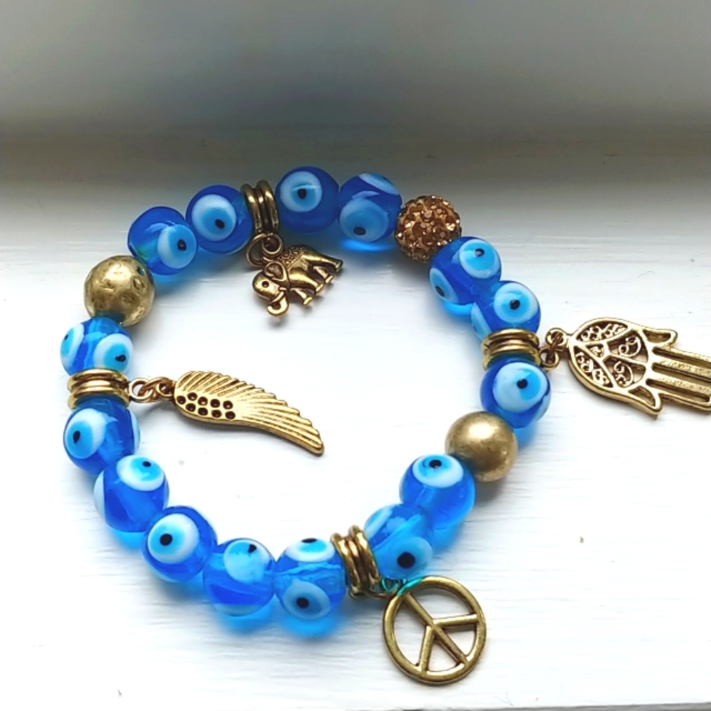 ✨BOGO FREE✨Blue glass beads evil eye stretch bracelet with gold charms & multi